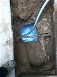 Foam: on tank under driveway.