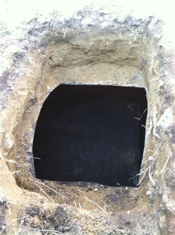 Remove sludge from inside of tank and clean tank.